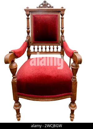 red antique velvet and ornate armchair Stock Photo