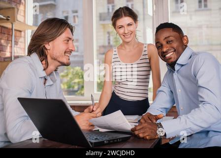 Business partner having meeting in office and discussing something Stock Photo