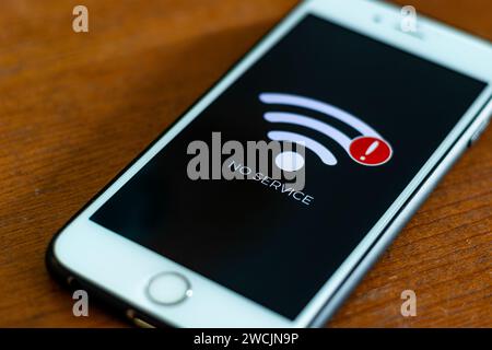 Smart phone with sign no service on screen. Communication, cellular problem, bad connection concept. Stock Photo