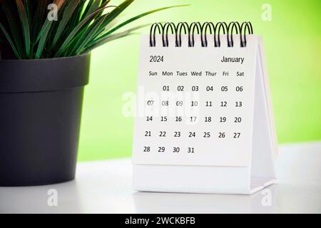 January 2024 Desk Calendar with potted plant Stock Photo - Alamy