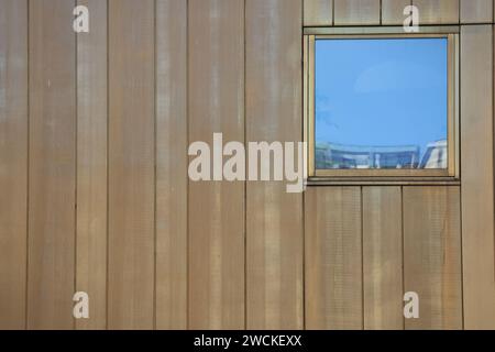 Outdoor wooden wall with window Stock Photo