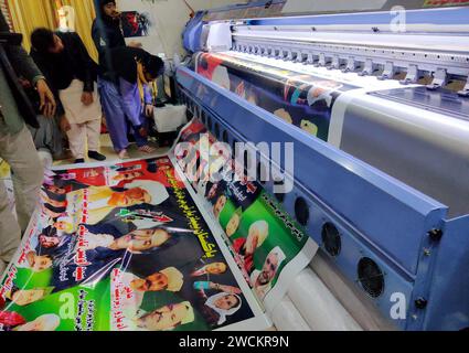 Laborers Are Working At A Printing Press Busy In Printing Posters For   Laborers Are Working At A Printing Press Busy In Printing Posters For Publicity Party Candidate In Connection Of Election Campaigns Of The General Election 2024 In Sukkur On Tuesday January 16 2024 2wckr9n 