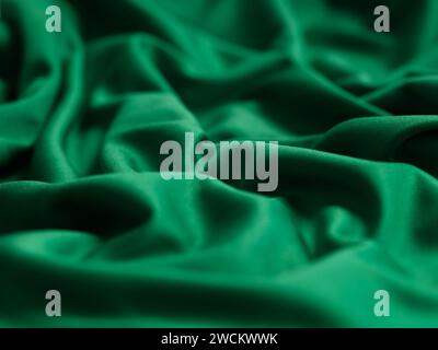 A crumpled green fabric background. Close up. Stock Photo