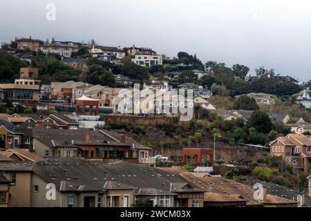Brown houses on a hillside, neighborhood in various shades of tan and beige Stock Photo