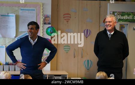 File photo dated 04/01/24 of Prime Minister Rishi Sunak, with Lee Anderson MP for Ashfield (right), during a visit to Woodland View Primary School in Sutton-in-Ashfield, Nottinghamshire. Lee Anderson and Brendan Clarke-Smith have both resigned in order to vote for amendments to the Government's Rwanda Bill, they have said on X. Issue date: Tuesday January 16, 2024. Stock Photo