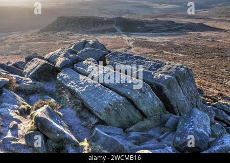 The Kit-Kat Stones on Higger Tor, Derbyshire, Peak District, near Sheffield, looking towards the Iron-Age hill-fort of Carl Wark Stock Photo