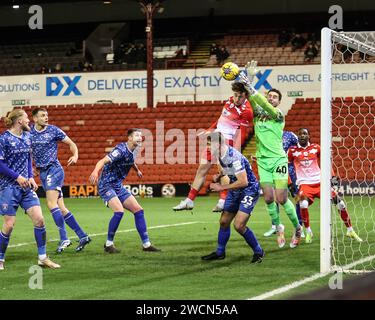 Callum Styles of Barnsley and Harry Lewis of Carlisle United  United battle for the ball during the Sky Bet League 1 match Barnsley vs Carlisle United at Oakwell, Barnsley, United Kingdom, 16th January 2024  (Photo by Mark Cosgrove/News Images) Stock Photo