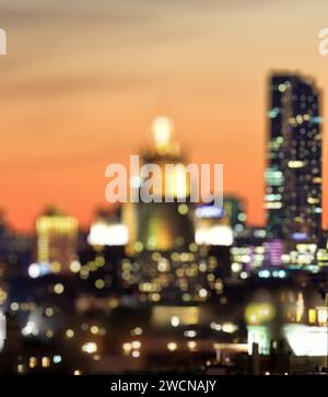 Night view with bokeh on the city lights. Abstract background of city at night. Cityscape bokeh, Blurred Photo, cityscape at twilight time Stock Photo
