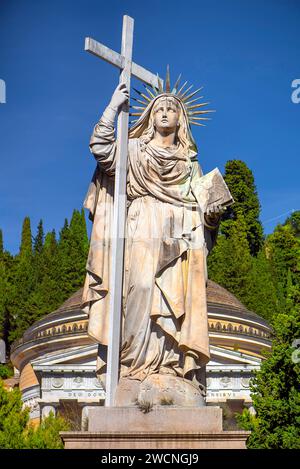 Monumental statue of a saint at the entrance to the Staglieno Monumental Cemetery, Cimitero Monumentale di Staglieno, Piazzale Giovanni Battista Stock Photo