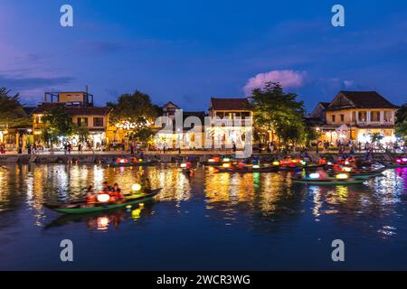 Scenery of Hoi An ancient town by Thu Bon River in Vietnam at night Stock Photo
