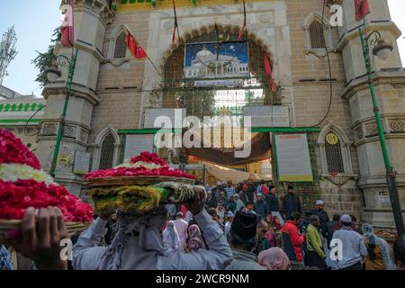 Ajmer, India - January 3, 2024: People waiting to enter the Dargah Sharif in Ajmer, India. Dargah Sharif is the tomb of the Sufi saint. Stock Photo