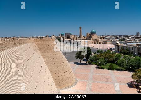 The Ark of Bukhara inside walls. The Ark Citadel is an ancient massive fortress located in Bukhara city, Uzbekistan. Blue sky with copy space for text Stock Photo