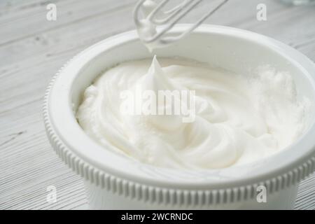 egg whites beaten to a frothy stage Stock Photo