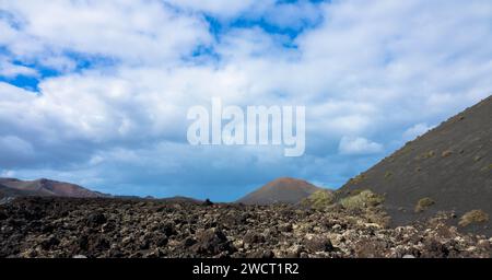 Spectacular view of the Fire Mountains at Timanfaya National Park, this unique area consisting entirely of volcanic soils. Lanzarote, Spain Stock Photo