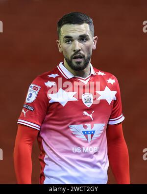 Barnsley, UK. 16th Jan, 2024. Adam Phillips of Barnsley with the ball during the Sky Bet League 1 match Barnsley vs Carlisle United at Oakwell, Barnsley, United Kingdom, 16th January 2024 (Photo by Mark Cosgrove/News Images) in Barnsley, United Kingdom on 1/16/2024. (Photo by Mark Cosgrove/News Images/Sipa USA) Credit: Sipa USA/Alamy Live News Stock Photo