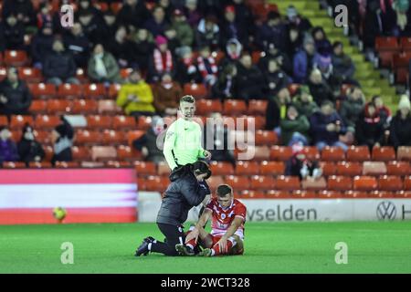 Barnsley, UK. 16th Jan, 2024. Jack Shepherd of Barnsley receives treatment during the Sky Bet League 1 match Barnsley vs Carlisle United at Oakwell, Barnsley, United Kingdom, 16th January 2024 (Photo by Mark Cosgrove/News Images) in Barnsley, United Kingdom on 1/16/2024. (Photo by Mark Cosgrove/News Images/Sipa USA) Credit: Sipa USA/Alamy Live News Stock Photo