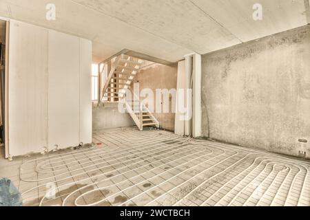 an unfinished room that is being renovated and ready to be used as a new home for the house's interior Stock Photo
