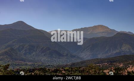 A scenic view of mountains under a sunny blue sky in Colorado, USA Stock Photo