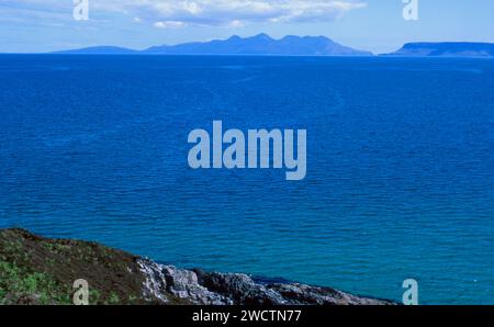 The Isle of Rum viewed from the beach at Arisaig Lochaber Scotland Stock Photo