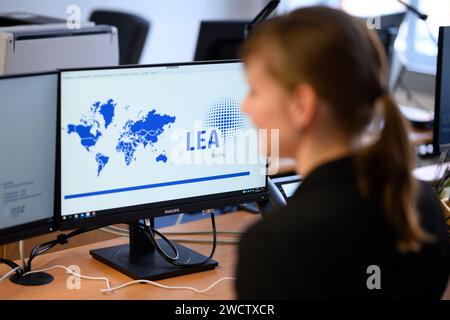 Berlin, Germany. 17th Jan, 2024. An employee sits at a computer in the Central Naturalization Office of the State Office for Immigration (LEA) in Berlin-Wedding. The centralization of all naturalization matters is intended to make naturalization procedures more efficient and accessible. Digital processes should make it possible to complete an individual application procedure within six months. Credit: Bernd von Jutrczenka/dpa/Alamy Live News Stock Photo