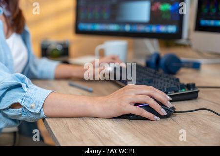 Female editor making video about vlogger at home, Occupation Freelance. Stock Photo