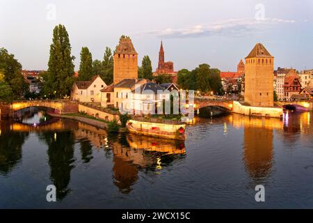France, Bas Rhin, Strasbourg, old town listed as World Heritage by UNESCO, the Petite France District, the Covered Bridges over the River Ill and Notre Dame Cathedral Stock Photo