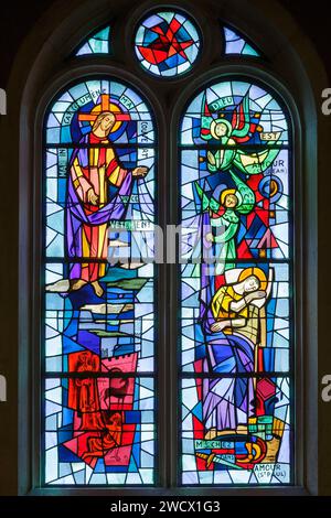 France, Meurthe et Moselle, Bouxieres aux dames, St Martin church, stained glass window made by Atelier Benoit Freres (Benoit brothers workshop) masters glassmakers in Nancy in 1954 representing the life of St Martin first bishop of Tours Stock Photo