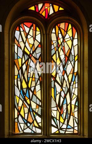 France, Meurthe et Moselle, Bouxieres aux dames, St Martin church, stained glass window made by Atelier Benoit Freres (Benoit brothers workshop) masters glassmakers in Nancy in 1954 representing geometrical patterns Stock Photo