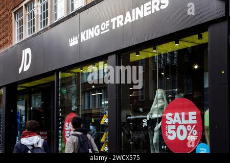 Up to 50% off red sale sign in the window of JD Sports in Exeter, Devon UK Stock Photo