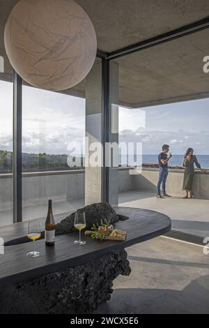 Portugal, Azores archipelago, Pico island, wine tasting at the gourmet restaurant of Azores wine company, the winery hotel with minimalist design in raw concrete by Portuguese winemaker Antonio Maçanita, set between vines and volcano Stock Photo