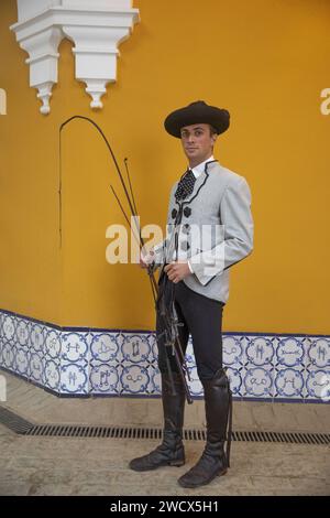 Spain, Andalusia, Jerez de la Frontera, Andalusian royal school of equestrian art, rider in Goyesque costume in the vaulted stables Stock Photo