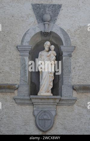 France, Haute Savoie Aravis massif, Le Reposoir, The Chartreuse du Reposoir today welcomes Carmelites. A statue of Saint Joseph and the baby Jesus Stock Photo