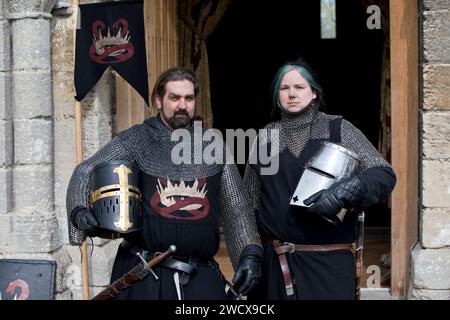 30th April 2023. Hedingham Castle, Suffolk, England.  Arthurian knight Sir Mordred with an unmasked black knight. Re-enactors gather for for a re-telling the story of King Arthur and Excalibur and celebration of all things Arthurian at Hedingham Castle. Stock Photo