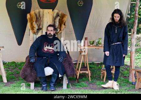 30th April 2023. Hedingham Castle, Suffolk, England.  Interpretation of Sir mordred with his page. Re-enactors gather for for a re-telling of the story of King Arthur and Excalibur and celebration of all things Arthurian at Hedingham Castle. Stock Photo