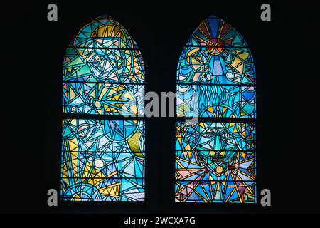 France, Moselle, Metz, Saint Maximin church, stained glass windows made according to drawings by Jean Cocteau executed in 1962 covering 14 bays or 24 windows Stock Photo
