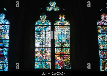 France, Moselle, Metz, Saint Maximin church, stained glass windows made according to drawings by Jean Cocteau executed in 1962 covering 14 bays or 24 windows Stock Photo