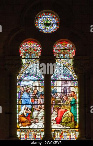 France, Meurthe et Moselle, Nancy, Sacre Coeur de Nancy (sacred Heart of Nancy) basilica built by architect Anthony Rougieux between 1902 and 1905 in Byzantine Romanesque style, stained glass window by master glassmaker Joseph Janin made in 1905 representing the biblical story of the healing of a born blind destroyed by bombing in 1917, restored in 1922 by master glassmaker Joseph Benoit with addition of vegetal decoration reminding the skylights of Art Nouveau style located Rue de Laxou Stock Photo