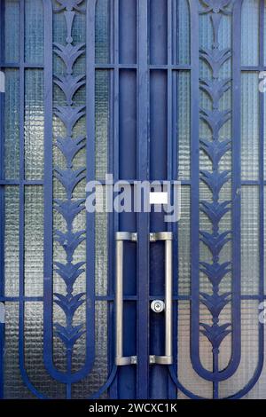 France, Meurthe et Moselle, Nancy, detail of the door with ironwork made of wrought iron of an apartment building located Rue des Jardiniers Stock Photo