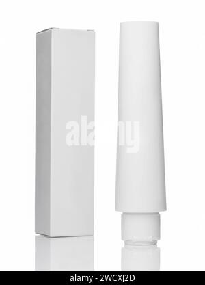 White blank tube for cosmetics with white carton packaging on white baclground. Stock Photo