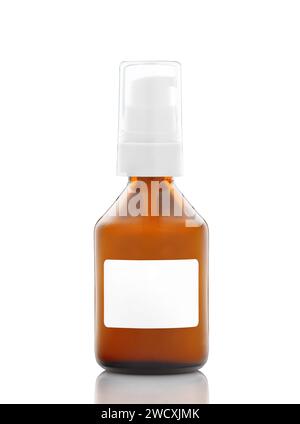 Dark cosmetic amber glass bottle with white label isolated on white background. Stock Photo