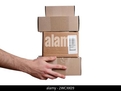 A man holds a stack of cardboard boxes in his hands. Relocation concept Stock Photo