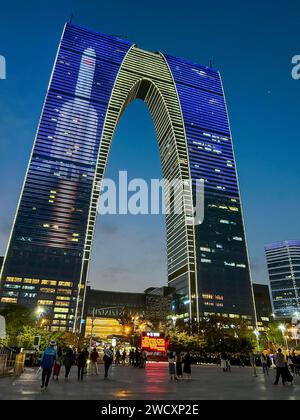 Suzhou, China, Nighttime View of Unusual Modern Architecture Building, Jinji Lake Scenic Area, « gate to the East » (credit Architect : RMJM) Stock Photo