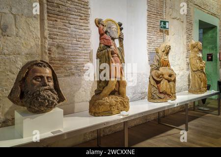 ancient sculptures and a bust in the entrance hall of the diocesan museum of the cathedral of Santa María in the city of Murcia, Spain, Europe Stock Photo