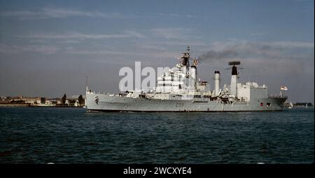 HMS Blake C99 Tiger Class light cruiser of the British Royal Navy leaving Portsmouth Harbour 16th September 1979 - Portsmouth, Hampshire, England, UK Stock Photo