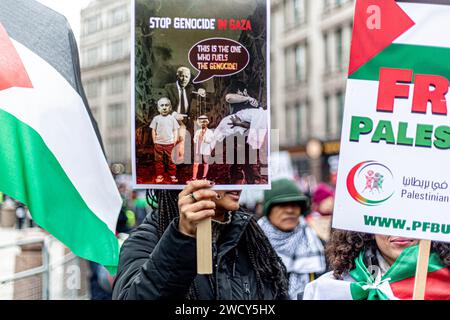 A global day of protests drew thousands of people including Children, who made their way through central London for a pro-Palestinian march, part of a global day of action against the longest and deadliest war between Israel and Palestinians in 75 years. Protesters held up banners, flags and placards as they walked along the embankment by the River Thames in support of Palestinian people in Gaza. London, United Kingdom. Stock Photo