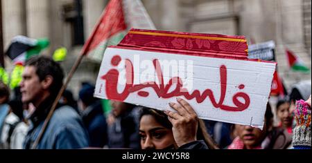 A global day of protests drew thousands of people including Children, who made their way through central London for a pro-Palestinian march, part of a global day of action against the longest and deadliest war between Israel and Palestinians in 75 years. Protesters held up banners, flags and placards as they walked along the embankment by the River Thames in support of Palestinian people in Gaza. London, United Kingdom. Stock Photo