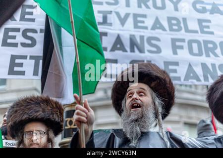 A global day of protests drew thousands of people including Children, who made their way through central London for a pro-Palestinian march, part of a global day of action against the longest and deadliest war between Israel and Palestinians in 75 years. Protesters held up banners, flags and placards as they walked along the embankment by the River Thames in support of Palestinian people in Gaza. London, United Kingdom. Stock Photo