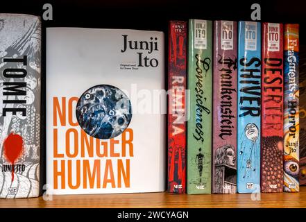 Junji Ito, "No longer human" and other books.  Japanese manga artist books on shelf translated in English Stock Photo