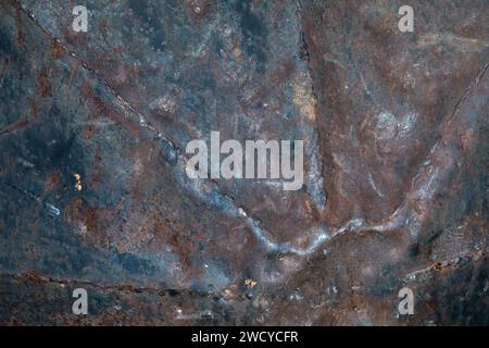 Background from an old metal shield with worn paint and traces of corrosion Stock Photo