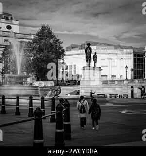 London, 07th October 2023: Pedestrians are walking across Trafalgar Square, where the new 'Antelope' Sculpture is installed on the Fourth Plinth. Stock Photo